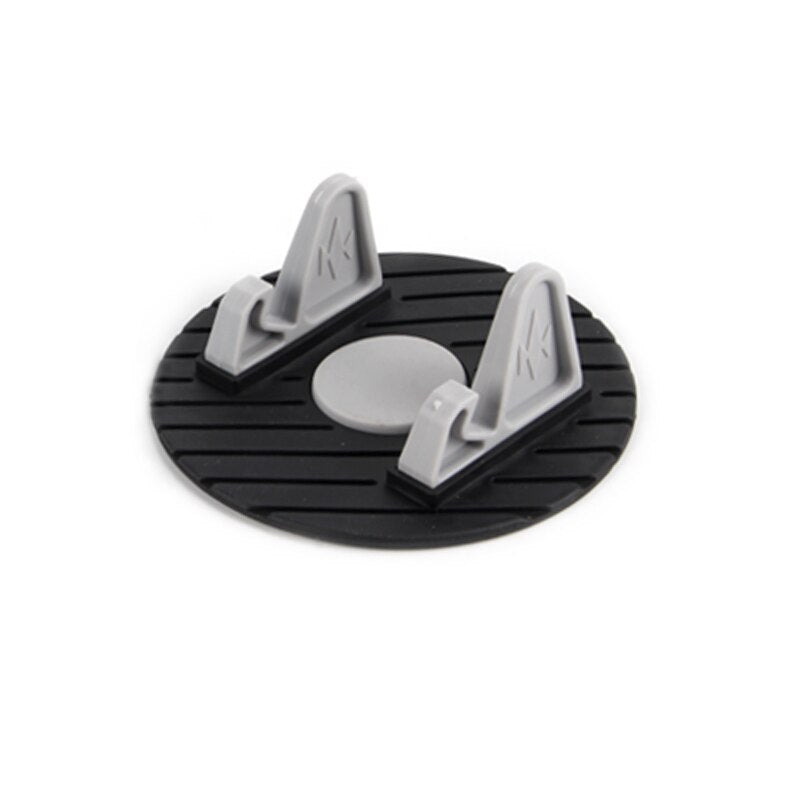 Mini universal soporte de coche para teléfono móvil ronda de silicona suave antideslizante estera GPS por gravedad